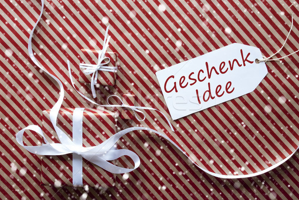 Stock photo: Gifts With Label, Snowflakes, Geschenk Idee Means Gift Idea