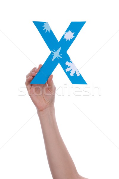 Hand Holding a X Stock photo © Nelosa
