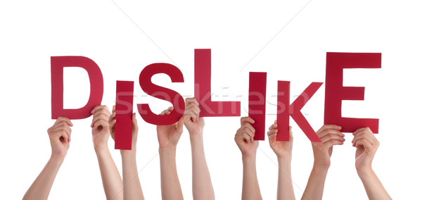 Many People Hands Holding Red Word Dislike Stock photo © Nelosa