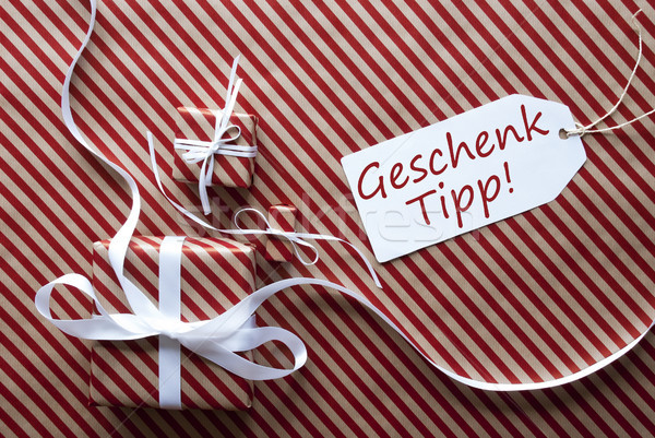 Two Gifts With Label, Geschenk Tipp Means Gift Tip Stock photo © Nelosa