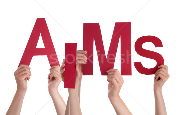 Many People Hands Holding Red Word Aims  Stock photo © Nelosa