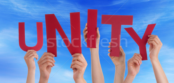 Many People Hands Holding Red Word Unity Blue Sky Stock photo © Nelosa