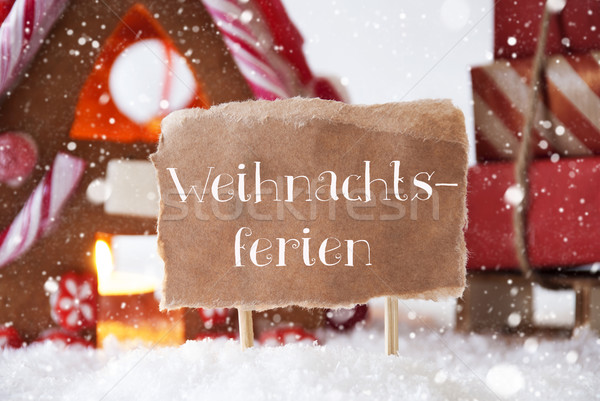 Gingerbread House With Sled, Snowflakes, Weihnachtsferien Means Christmas Break Stock photo © Nelosa