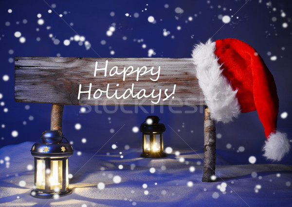 Christmas Card With Sign, Candlelight Santa Hat, Happy Holidays Stock photo © Nelosa