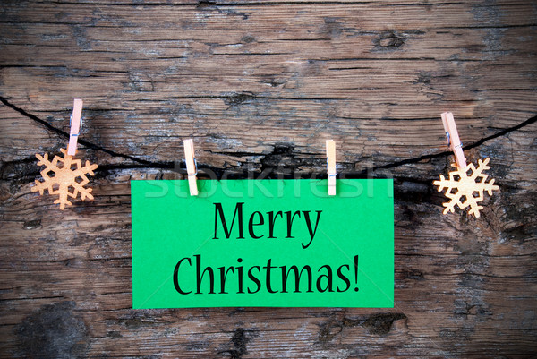 Stock photo: Green Tag with Merry Christmas