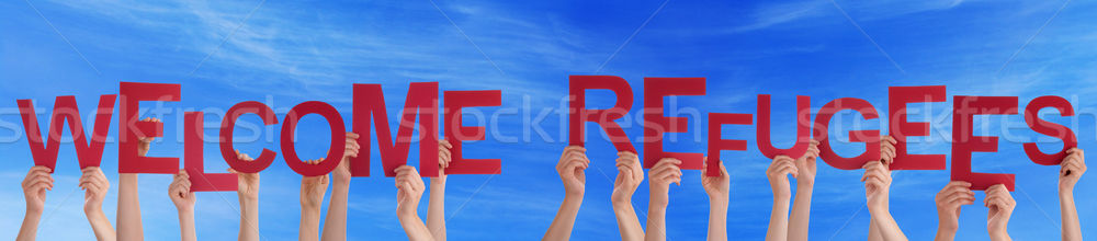 Many People Hands Holding Word Welcome Refugees, Blue Sky Stock photo © Nelosa
