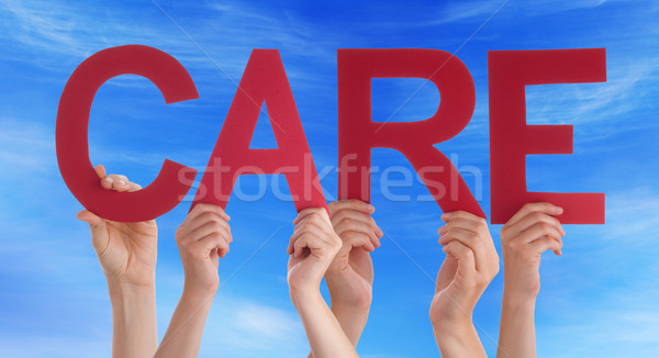 Hands Holding Red Straight Word Care Blue Sky Stock photo © Nelosa