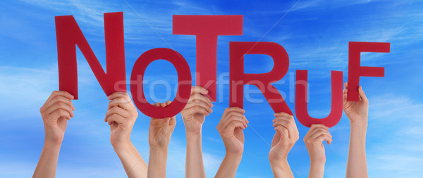 People Hold German Notruf Means Emergency Blue Sky Stock photo © Nelosa
