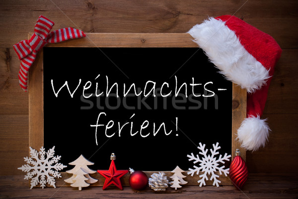 Stock photo: Brown Blackboard Hat Weihnachtsferien Means Christmas Holiday