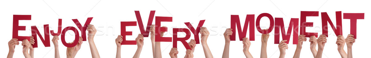 People Hands Holding Red Word Enjoy Every Moment Stock photo © Nelosa