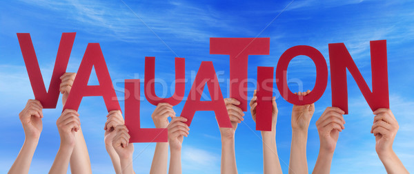 Many People Hands Holding Red Word Valuation Blue Sky Stock photo © Nelosa