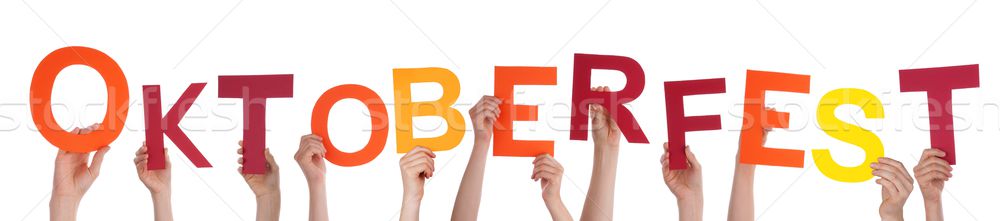 Persons Holding the German Word Oktoberfest Stock photo © Nelosa