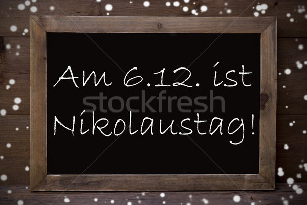 Chalkboard With Nikolaustag Means Nicholas Day, Snowflakes Stock photo © Nelosa