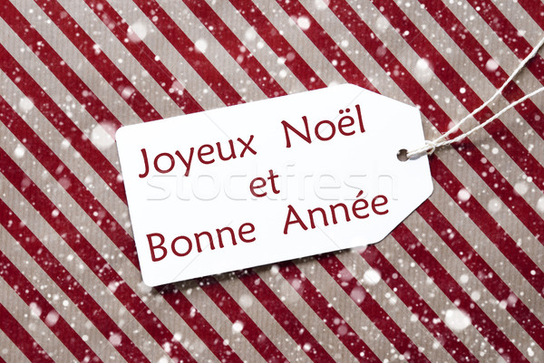 Label On Red Paper, Snowflakes, Bonne Annee Means New Year Stock photo © Nelosa