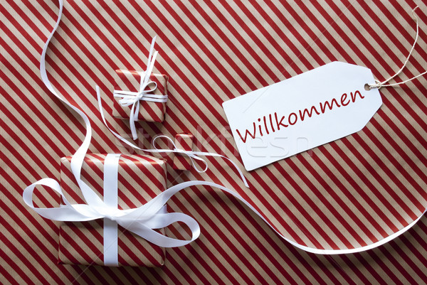 Two Gifts With Label, Willkommen Means Welcome Stock photo © Nelosa