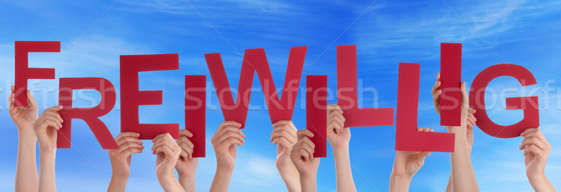 People Hold Red German Freiwillig Means Voluntary Stock photo © Nelosa