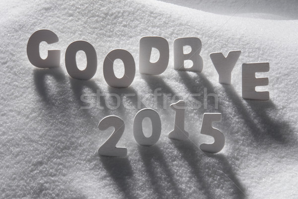 White Christmas Word Goodbye 2015 On Snow Stock photo © Nelosa