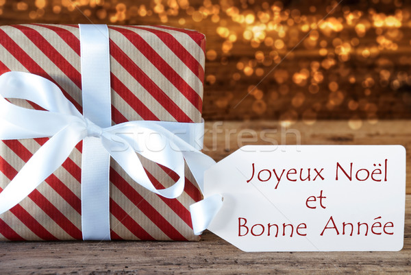Atmospheric Christmas Gift With Label, Bonne Annee Means New Yea Stock photo © Nelosa