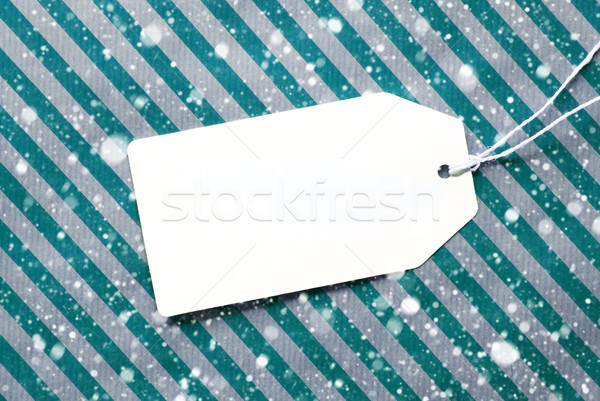 Label On Turquoise Wrapping Paper And Copy Space, Snowflakes Stock photo © Nelosa