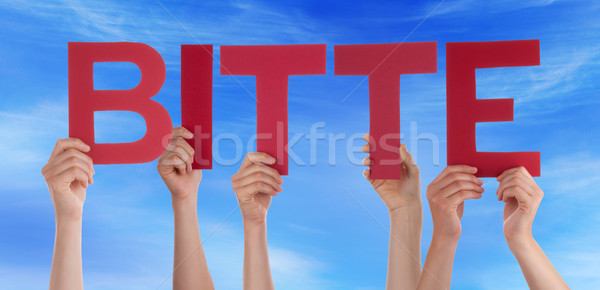 Stock photo: People Hold  German Bitte Means Please Blue Sky