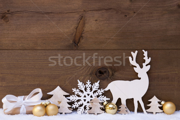 Golden Christmas Decoration, Snow, Tree, Reindeer And Gift Stock photo © Nelosa