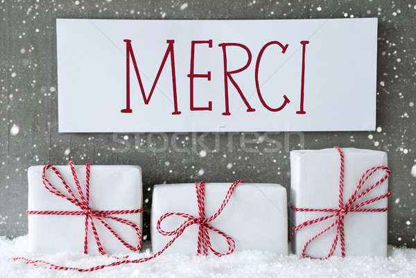 White Gift With Snowflakes, Merci Means Thank You Stock photo © Nelosa