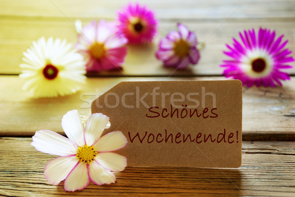 Sunny Label With German Text Schoenes Wochenende Means Happy Weekend With Cosmea Blossoms Stock photo © Nelosa