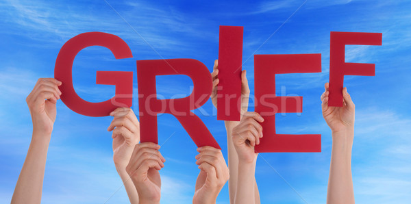 Many People Hands Holding Red Word Grief Blue Sky Stock photo © Nelosa