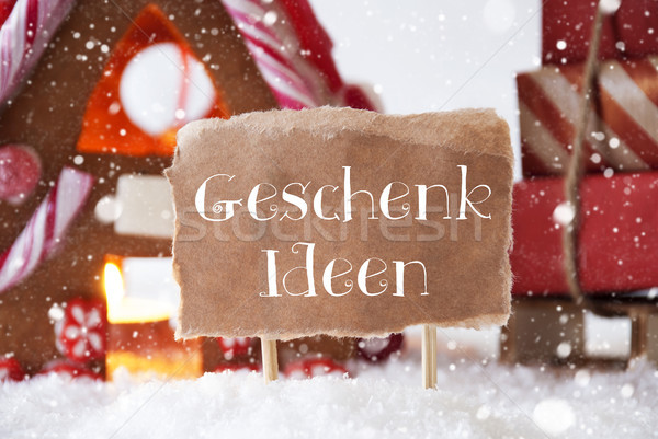 Gingerbread House With Sled, Snowflakes, Geschenk Ideen Means Gift Ideas Stock photo © Nelosa