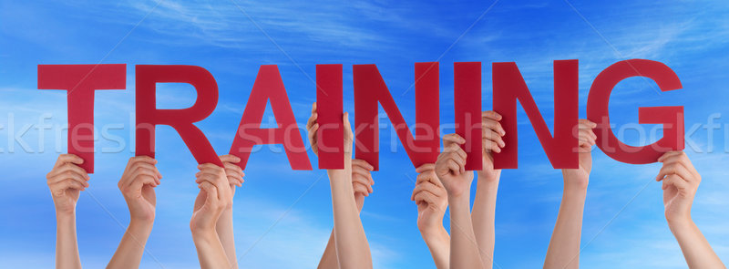 Many People Hands Holding Red Straight Word Training Blue Sky Stock photo © Nelosa