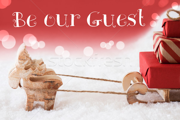 Reindeer With Sled, Red Background, Text Happy Be Our Guest Stock photo © Nelosa