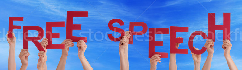 Hands Holding Red Word Free Speech Blue Sky Stock photo © Nelosa