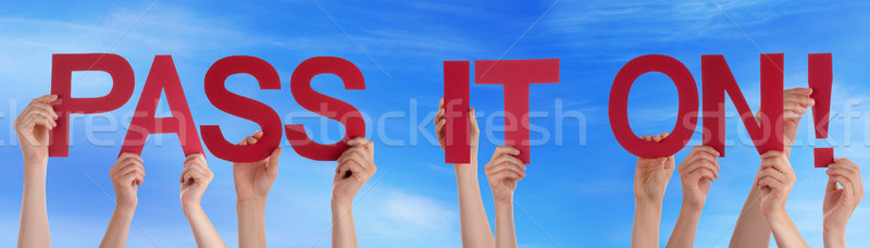 Hands Holding Straight Word Pass It On Blue Sky Stock photo © Nelosa