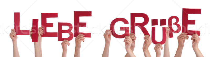 People Holding German Word Liebe Gruesse Means Love Stock photo © Nelosa