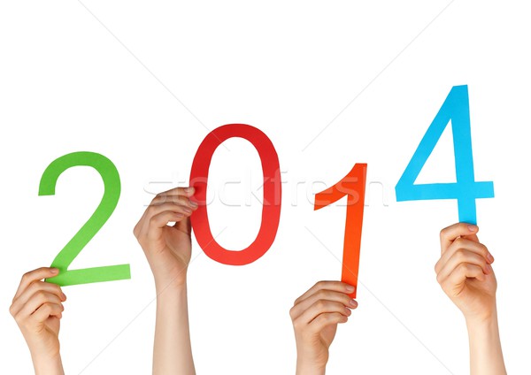 hands holding 2014 Stock photo © Nelosa