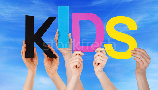Many People Hands Holding Colorful Word Kids Blue Sky Stock photo © Nelosa