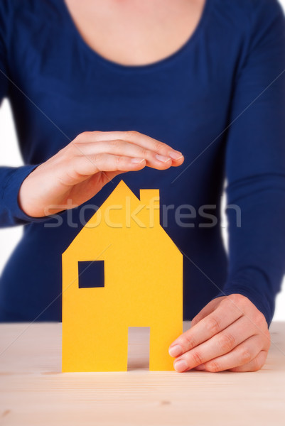 женщину дома изолированный рук стороны здании Сток-фото © Nelosa