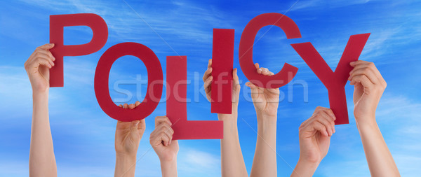 Many People Hands Holding Red Word Policy Blue Sky Stock photo © Nelosa