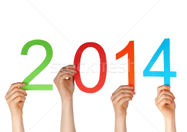 hands holding 2014 Stock photo © Nelosa