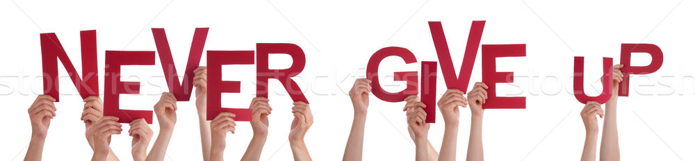 People Hands Holding Red Word Never Give Up Stock photo © Nelosa