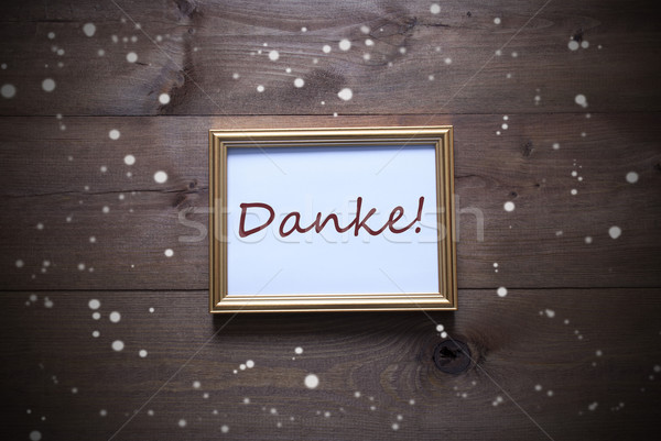 Golden Picture Frame With Danke Means Thank You And Snowflakes Stock photo © Nelosa