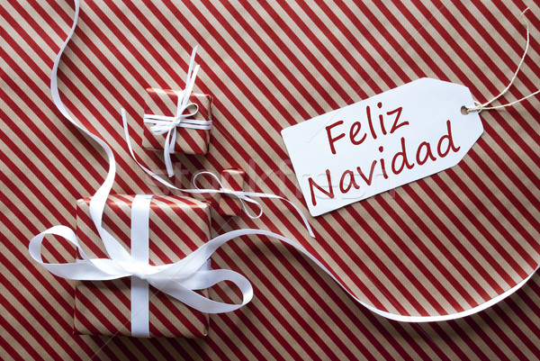 Two Gifts With Label, Feliz Navidad Means Merry Christmas Stock photo © Nelosa