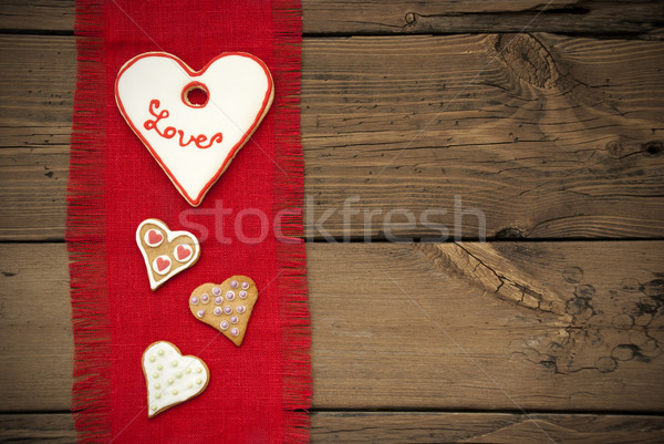 Red Fabric Texture With Heart Cookies Stock photo © Nelosa