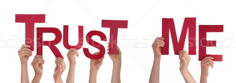 People Hands Holding Red Word Trust Me  Stock photo © Nelosa