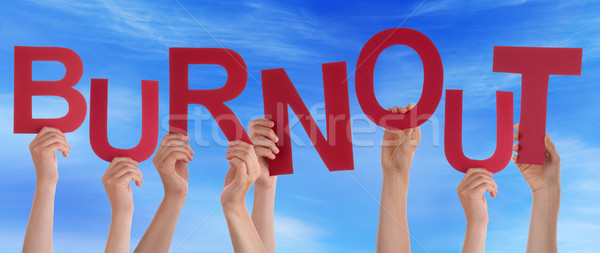 Many People Hands Holding Red Word Burnout Blue Sky Stock photo © Nelosa
