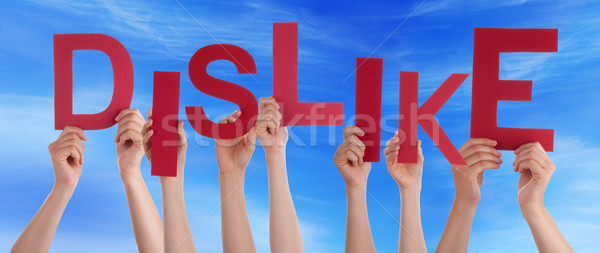 Many People Hands Holding Red Word Dislike Blue Sky Stock photo © Nelosa