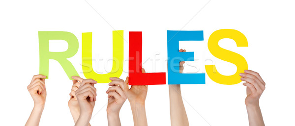 Many People Hands Holding Colorful Straight Word Rules Stock photo © Nelosa