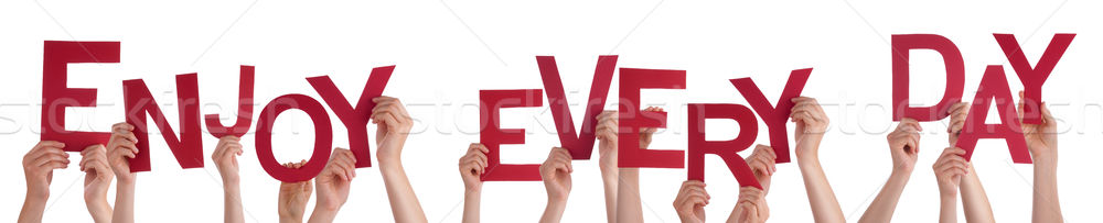 People Hands Holding Red Word Enjoy Every Day  Stock photo © Nelosa