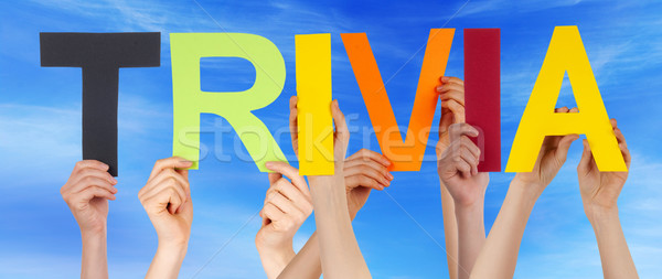 Many People Hands Holding Colorful Straight Word Trivia Blue Sky Stock photo © Nelosa