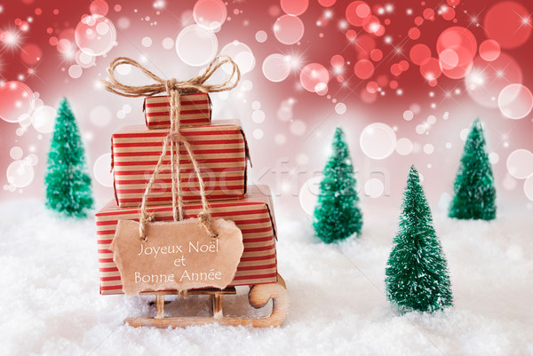 Christmas Sleigh On Red Background, Bonne Annee Means New Year Stock photo © Nelosa